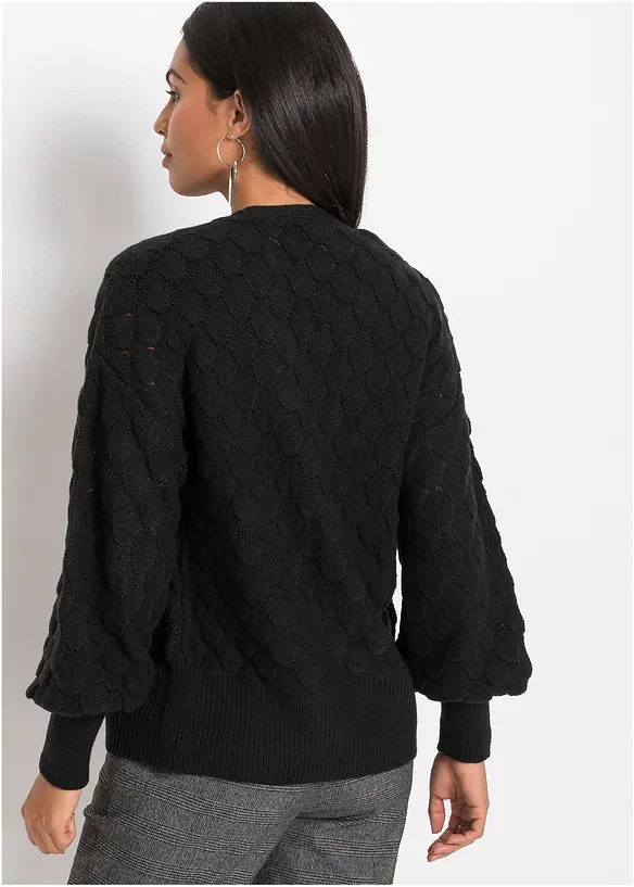 Ajour-Strickjacke in schwarz von hinten (im Anschnitt) - bonprix