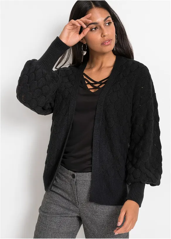 Ajour-Strickjacke in schwarz von vorne (im Anschnitt) - bonprix