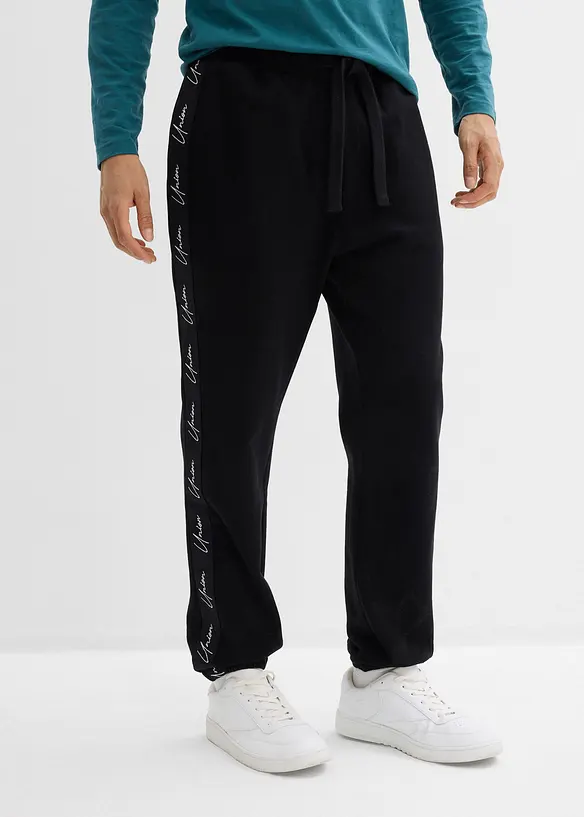 Jogginghose aus reiner Bio-Baumwolle, Loose Fit in schwarz von vorne - bonprix