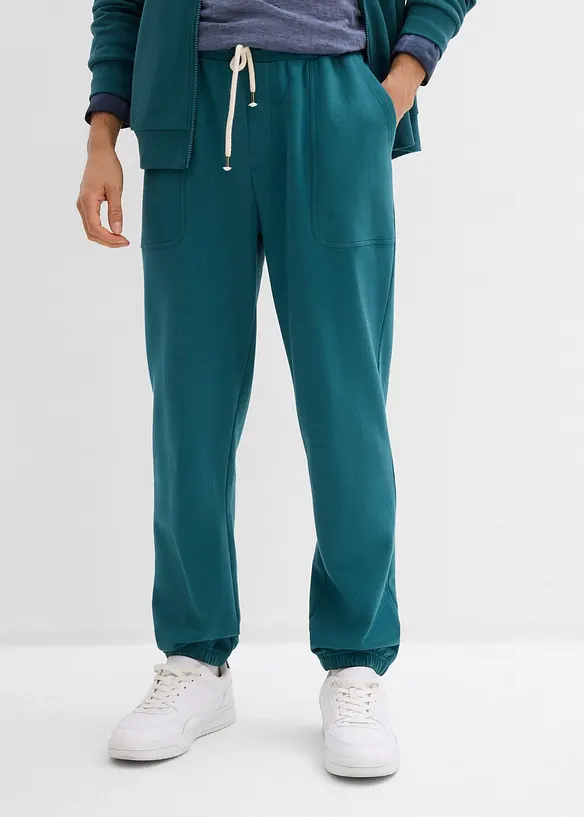 Jogginghose aus reiner Bio-Baumwolle in petrol von vorne - bonprix