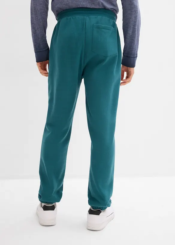 Jogginghose aus reiner Bio-Baumwolle in petrol von hinten - bonprix