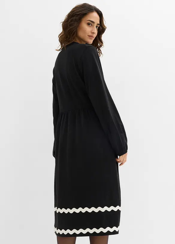 Jerseykleid in schwarz von hinten (Totalaufnahme) - bonprix