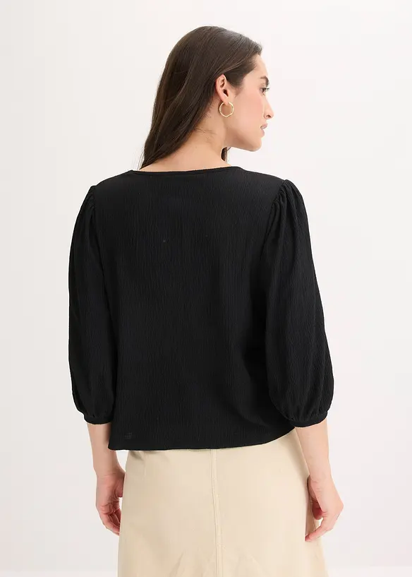 Shirtbluse aus strukturiertem Crêpe in schwarz von hinten (im Anschnitt) - bonprix