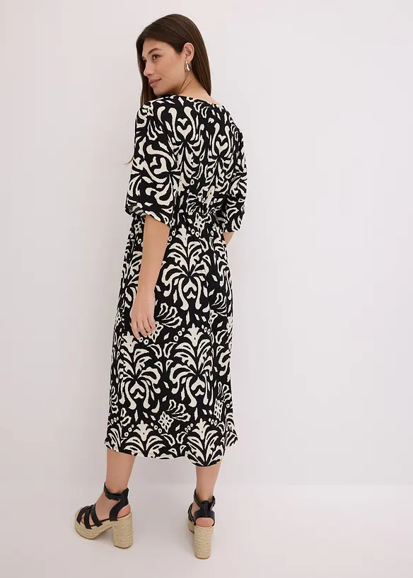 Jerseykleid in schwarz von hinten (Totalaufnahme) - bonprix