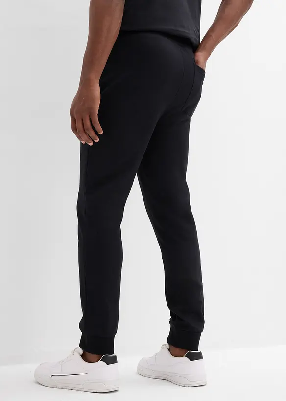 Jogginghose mit Kontrastdetails in schwarz von hinten - bonprix
