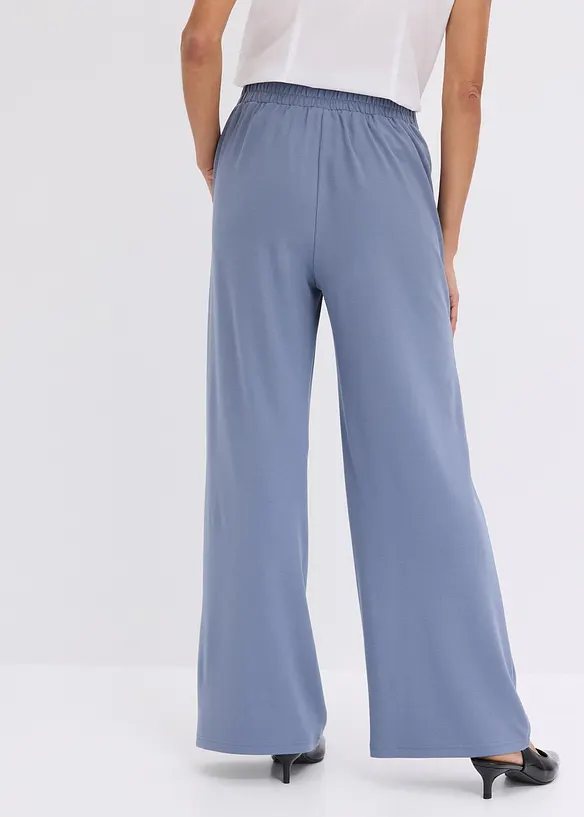 Jersey-Hose aus Punto di Roma in blau von hinten - bonprix