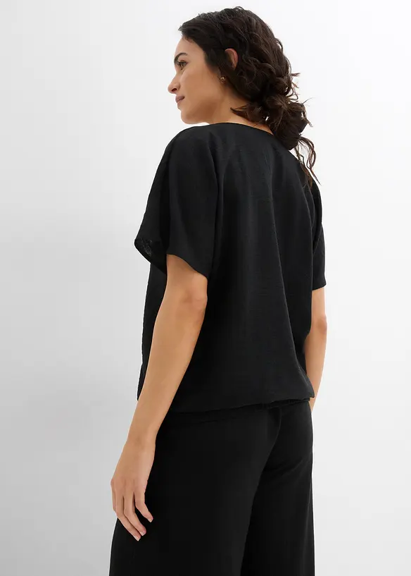 Oversize-Bluse mit Elastiksaum in schwarz von hinten (im Anschnitt) - bonprix