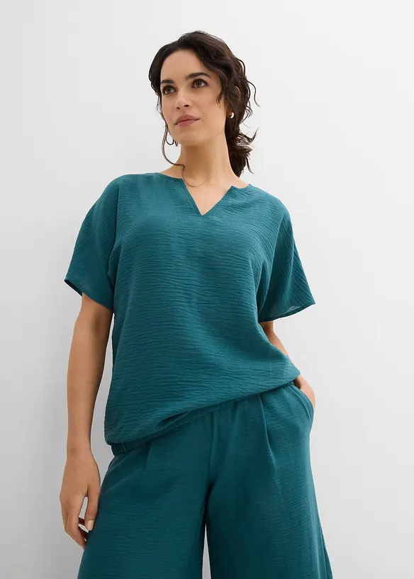 Oversize-Bluse mit Elastiksaum in petrol von vorne (im Anschnitt) - bonprix