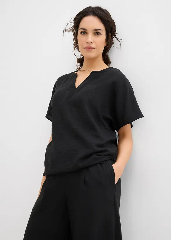 Oversize-Bluse mit Elastiksaum in schwarz von vorne (im Anschnitt) - bonprix