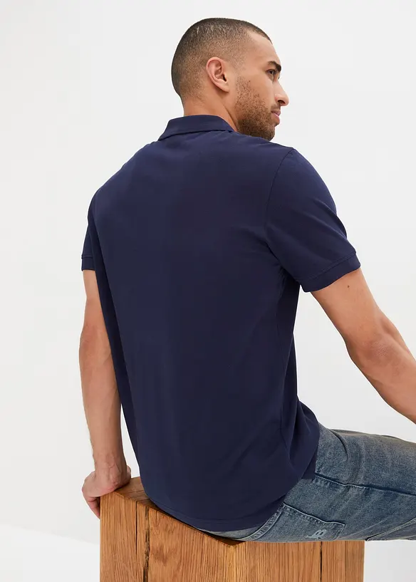 Piqué-Poloshirt aus reiner Bio-Baumwolle in blau von hinten (im Anschnitt) - bonprix