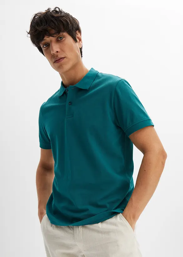 Piqué-Poloshirt aus reiner Bio-Baumwolle in petrol von vorne (im Anschnitt) - bonprix