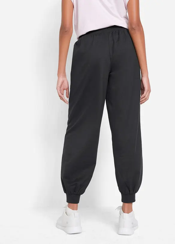 Jogginghose mit elastischem Bund in schwarz von hinten - bonprix
