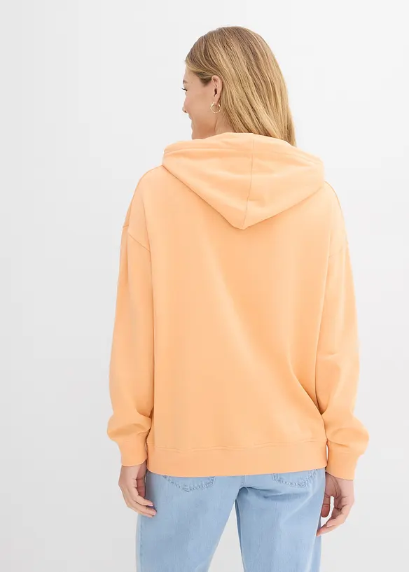 Oversize Hoodie in orange von hinten (im Anschnitt) - bonprix