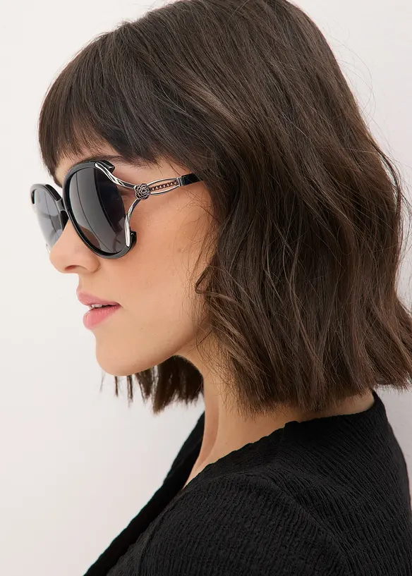 Sonnenbrille mit dekorativen Details in schwarz von vorne (im Anschnitt) - bonprix