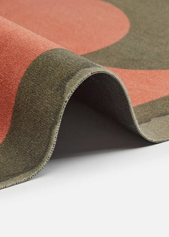 Waschbarer Teppich mit grafischer Blüte in grün (Detailaufnahme) - bonprix