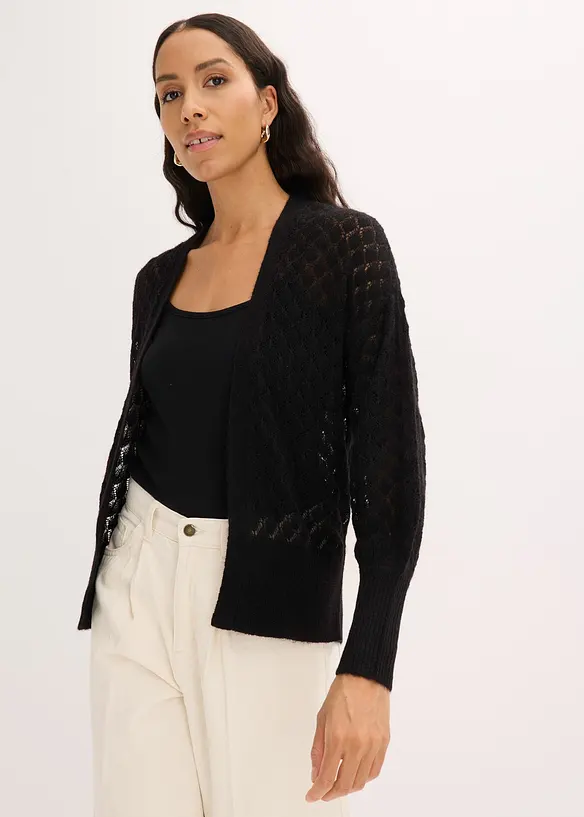 Ajour-Strickjacke in schwarz von vorne (im Anschnitt) - bonprix
