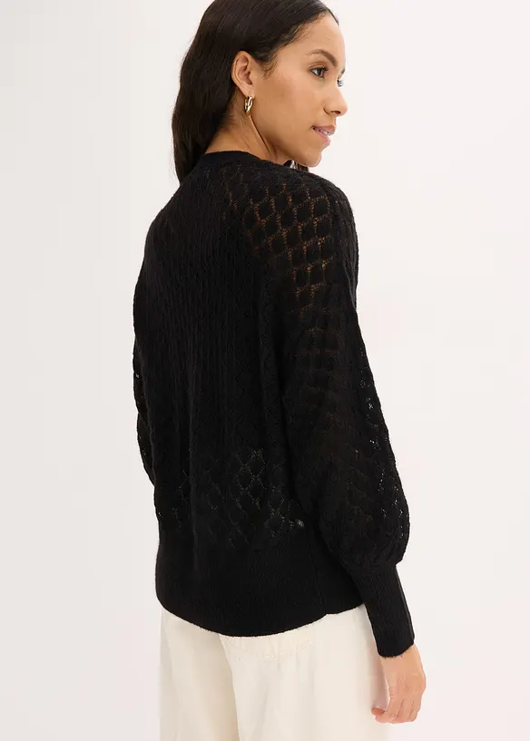 Ajour-Strickjacke in schwarz von hinten (im Anschnitt) - bonprix
