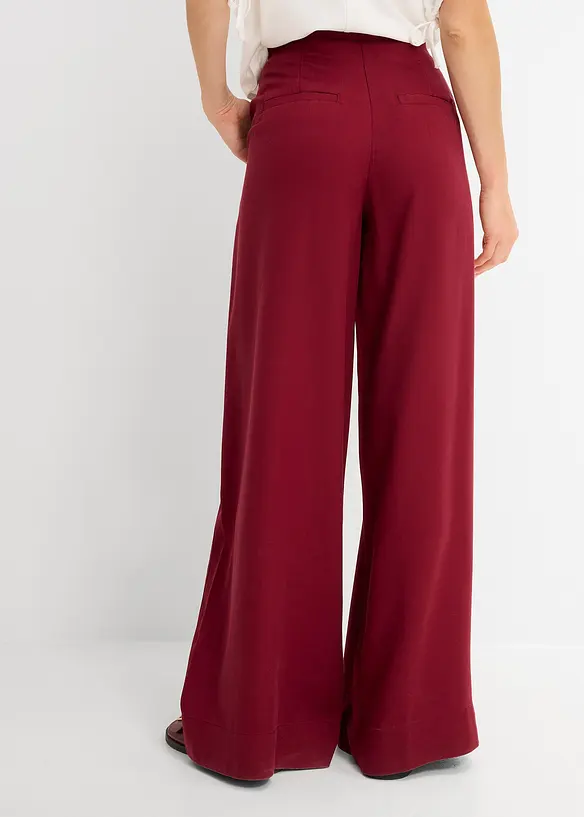 Bundfaltenhose aus fließendem Lyocell in rot von hinten - bonprix