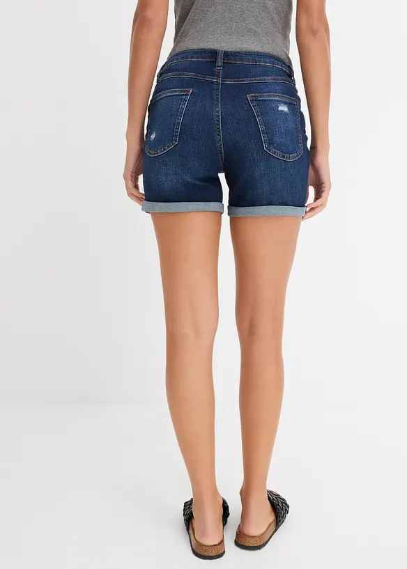 Jeansshorts Mid Waist mit Destroy- Effekten in blau von hinten - bonprix