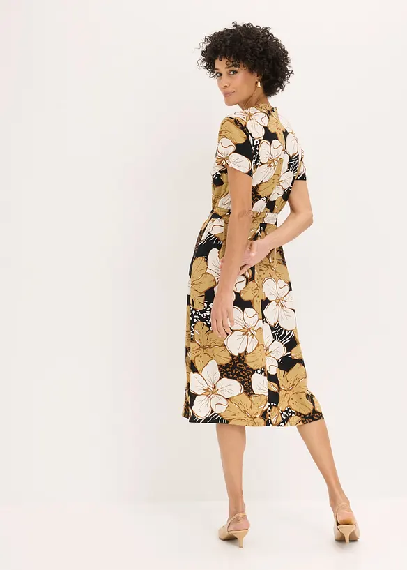 Blusenkleid mit Pünktchen in schwarz von hinten (Totalaufnahme) - bonprix