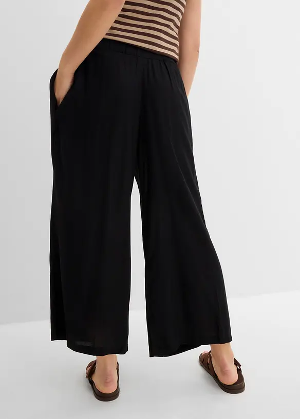 Weite Culotte aus fließender Viskose in schwarz von hinten - bonprix