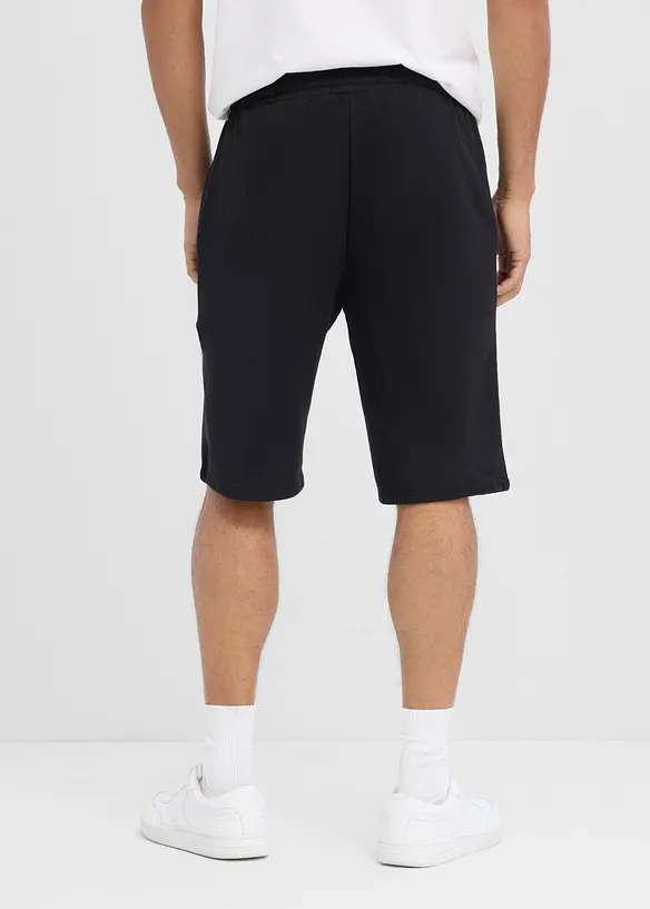 Sweat-Bermuda in Loose Fit (2er Pack) in schwarz von hinten - bonprix