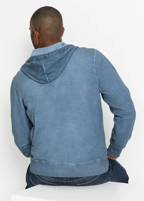 Kapuzen-Sweatjacke in ausgewaschener Optik in blau von hinten (im Anschnitt) - bonprix