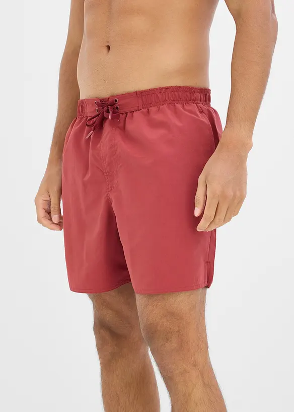 Badeshorts mit seitlichen Taschen in rot von vorne - bonprix