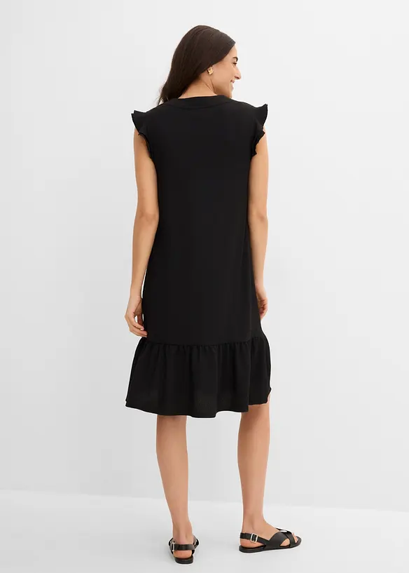 Jerseykleid mit Volant in schwarz von hinten (Totalaufnahme) - bonprix