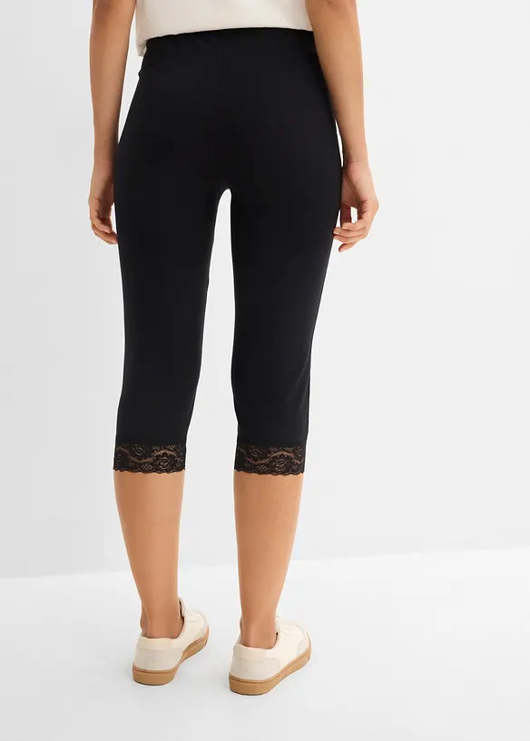 Capri-Leggings mit Spitzendetail in schwarz von hinten - bonprix