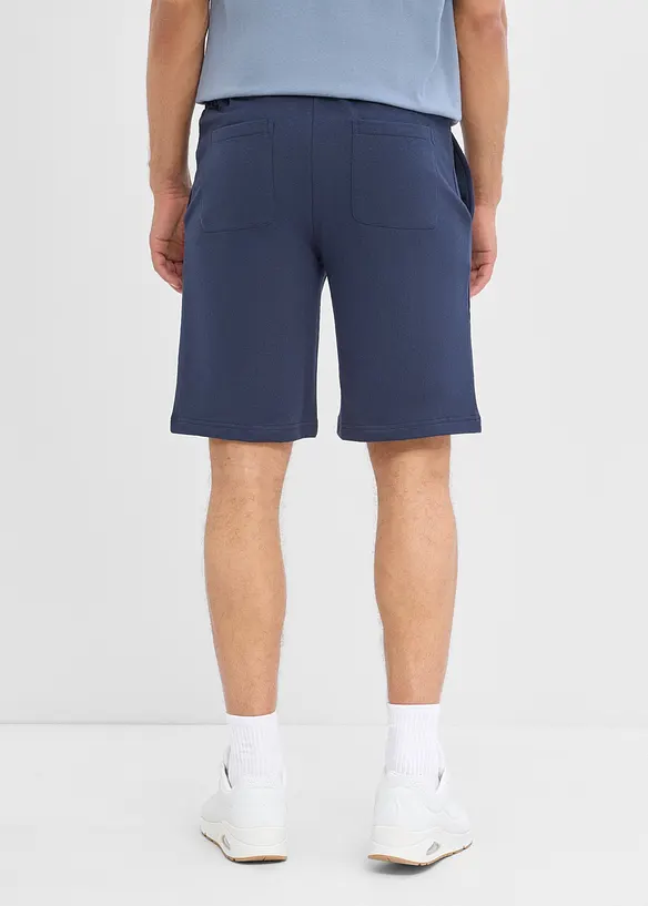 Sweat-Bermuda mit Dehnbund in Regular Fit in blau von hinten - bonprix