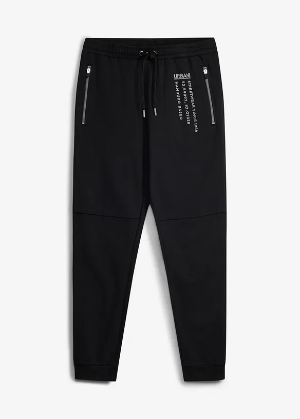 Jogginghose mit sportivem Druck aus reiner Baumwolle in schwarz von vorne - bonprix