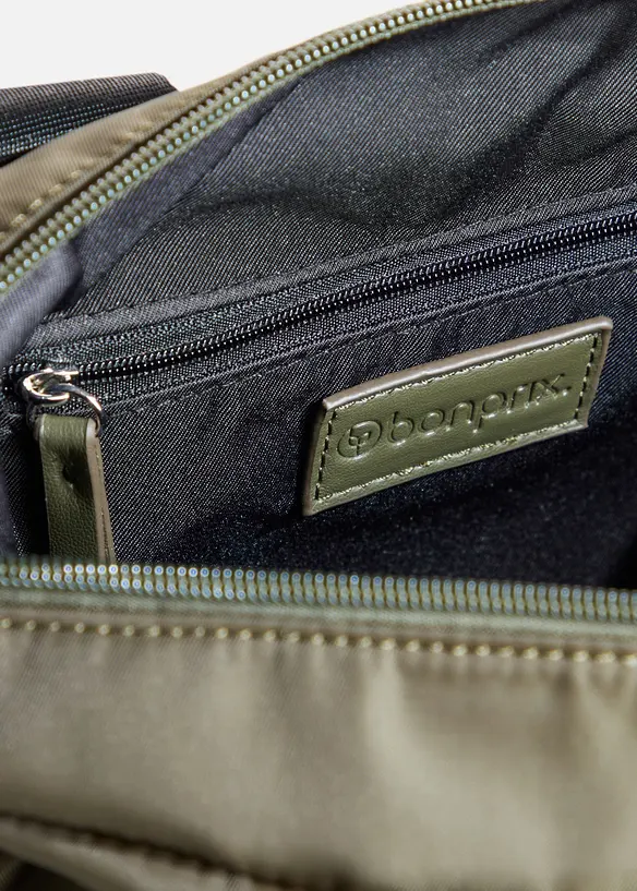 Sporttasche mit Kontrastdetails in grün geöffnet - bonprix