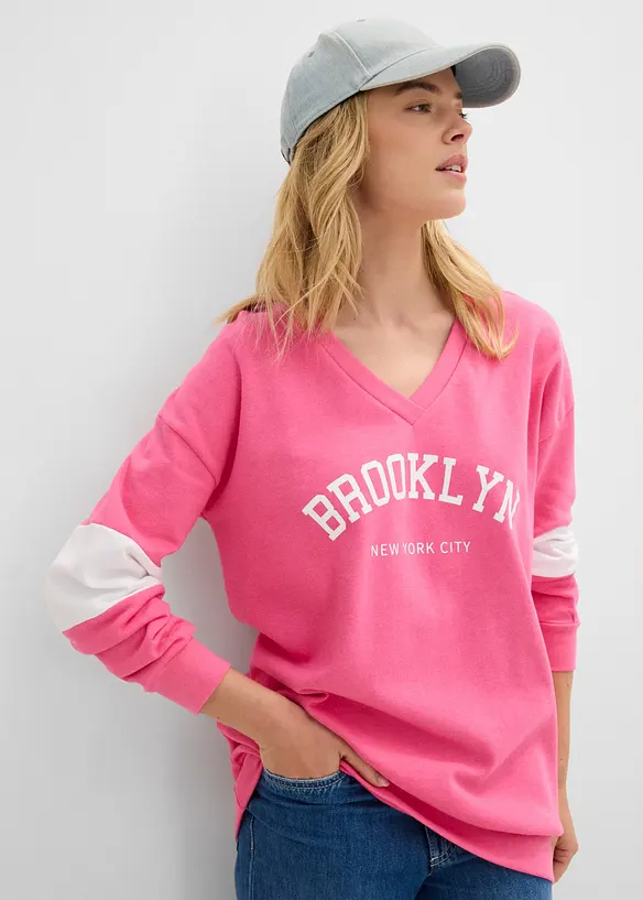 Oversize-Sweatshirt aus Baumwoll-Mix in pink von vorne (im Anschnitt) - bonprix