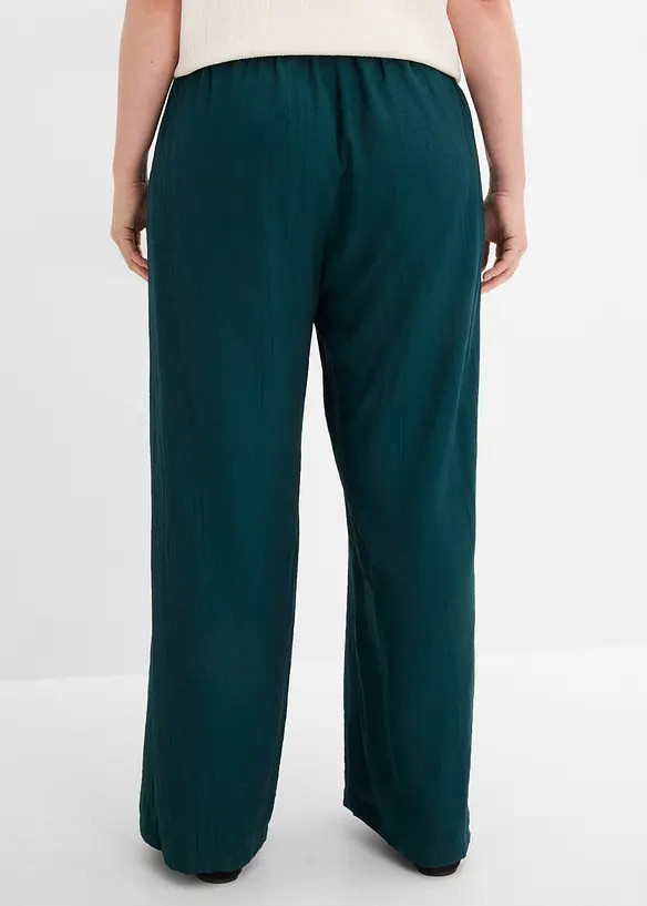 Schlupfhose aus strukturiertem Viskose-Mix in grün von hinten - bonprix