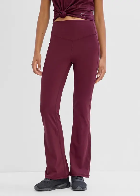 Ausgestellte Komfort Sport-Leggings mit Handytasche, schnelltrocknend in lila von vorne - bonprix