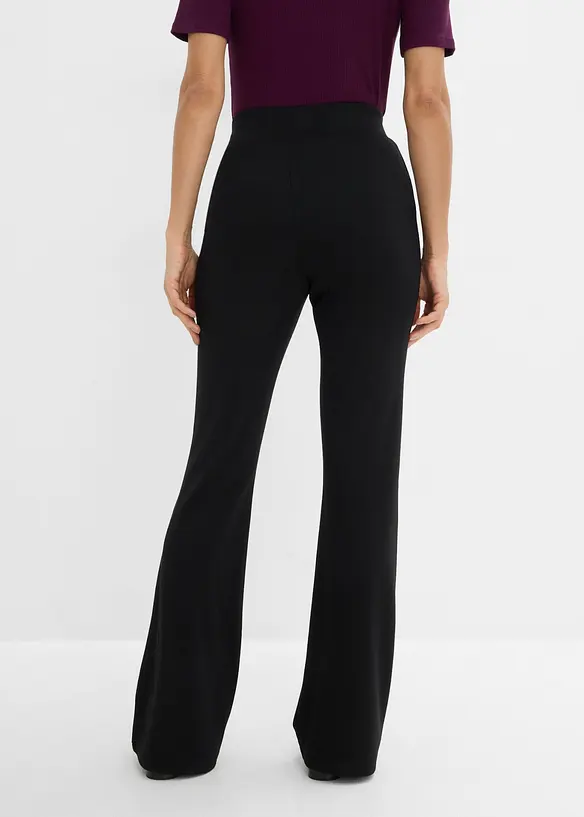 Ausgestellte Jersey-Hose in schwarz von hinten - bonprix