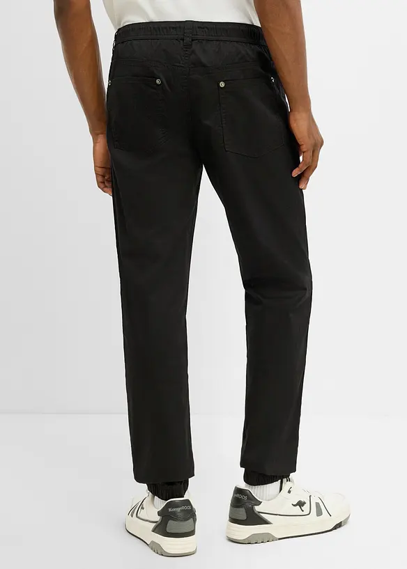 Regular-Fit Stretch-Schlupfhose, Tapered in schwarz von hinten - bonprix