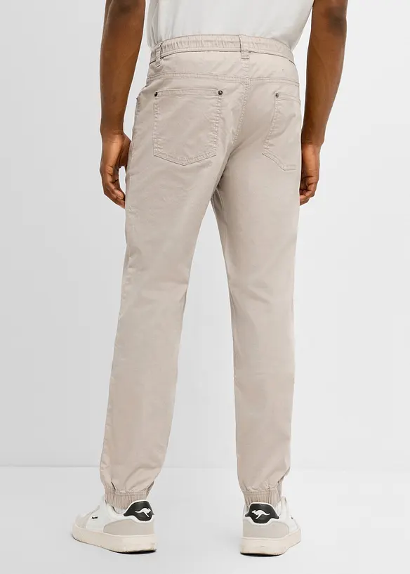 Regular-Fit Stretch-Schlupfhose, Tapered in grau von hinten - bonprix