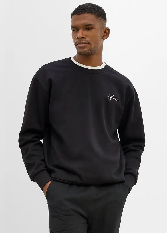 Sweatshirt aus reiner Bio Baumwolle, Loose Fit in schwarz von vorne (im Anschnitt) - bonprix