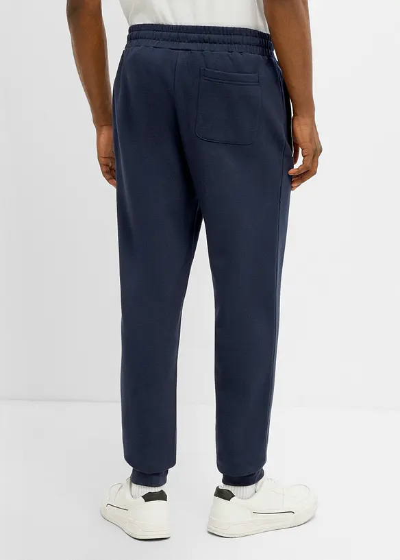Jogginghose in Regular Fit in blau von hinten - bonprix