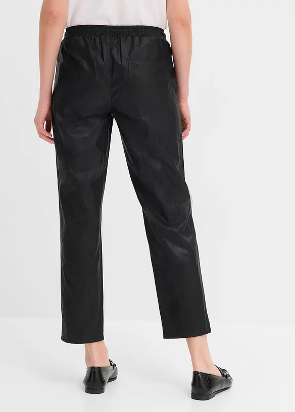 Lederimitat Schlupfhose mit Crash-Optik in schwarz von hinten - bonprix