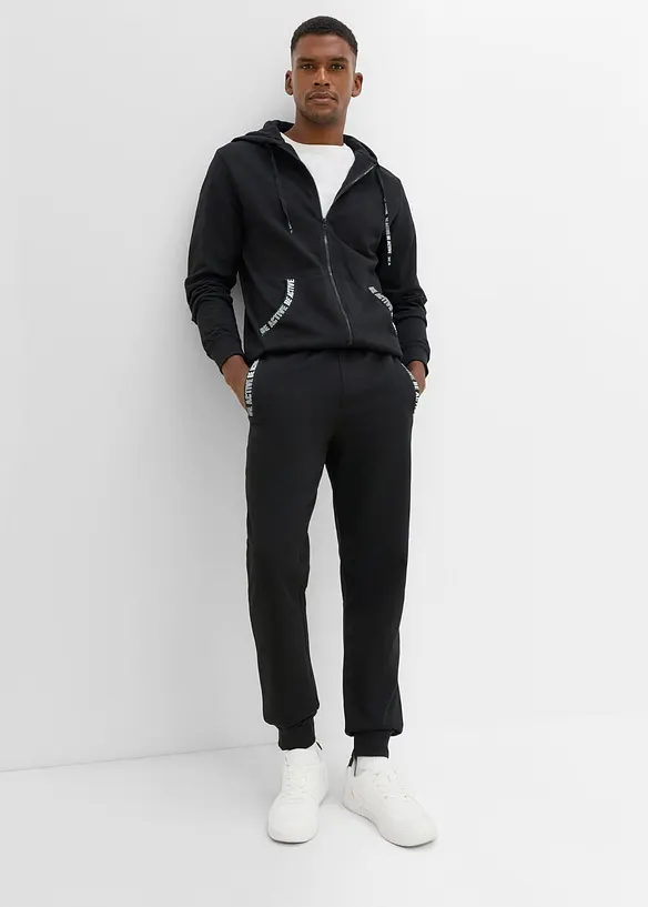 Jogginganzug mit Details aus weichem Baumwollmix (2-tlg. Set) in schwarz von vorne (Totalaufnahme) - bonprix
