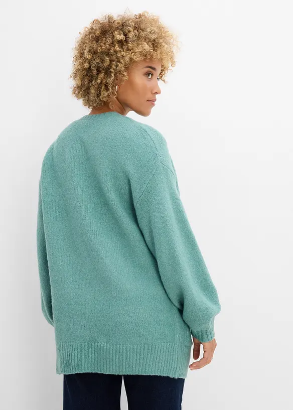 Oversize-Strickjacke in grün von hinten (im Anschnitt) - bonprix