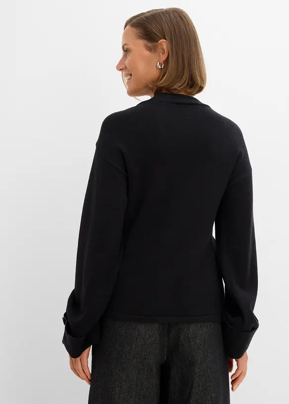 Taillierte Strickjacke aus Viskose-Mix in schwarz von hinten (im Anschnitt) - bonprix