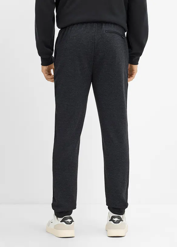 Thermo-Jogginghose mit Reißverschlusstaschen in grau von hinten - bonprix