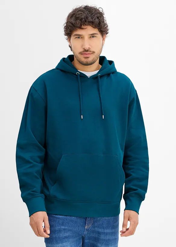 Hoodie in Loose Fit in petrol von vorne (im Anschnitt) - bonprix