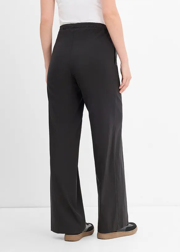 2-in-1 weite Stretch- Umstandshose für die Schwangerschaft und danach in schwarz von hinten - bonprix