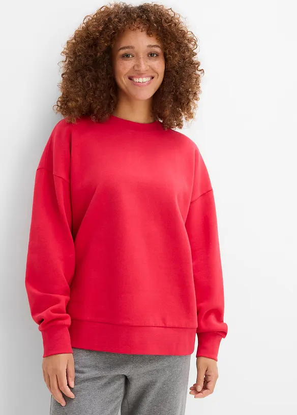 Oversize-Sweatshirt aus reiner Bio-Baumwolle in rot von vorne (im Anschnitt) - bonprix