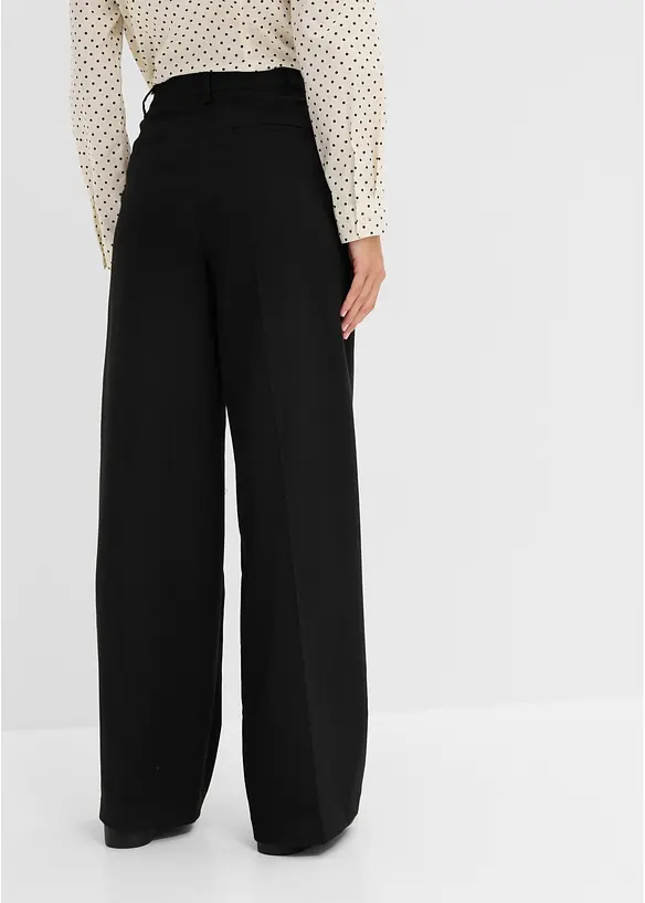 Weite Bundfaltenhose in schwarz von hinten - bonprix